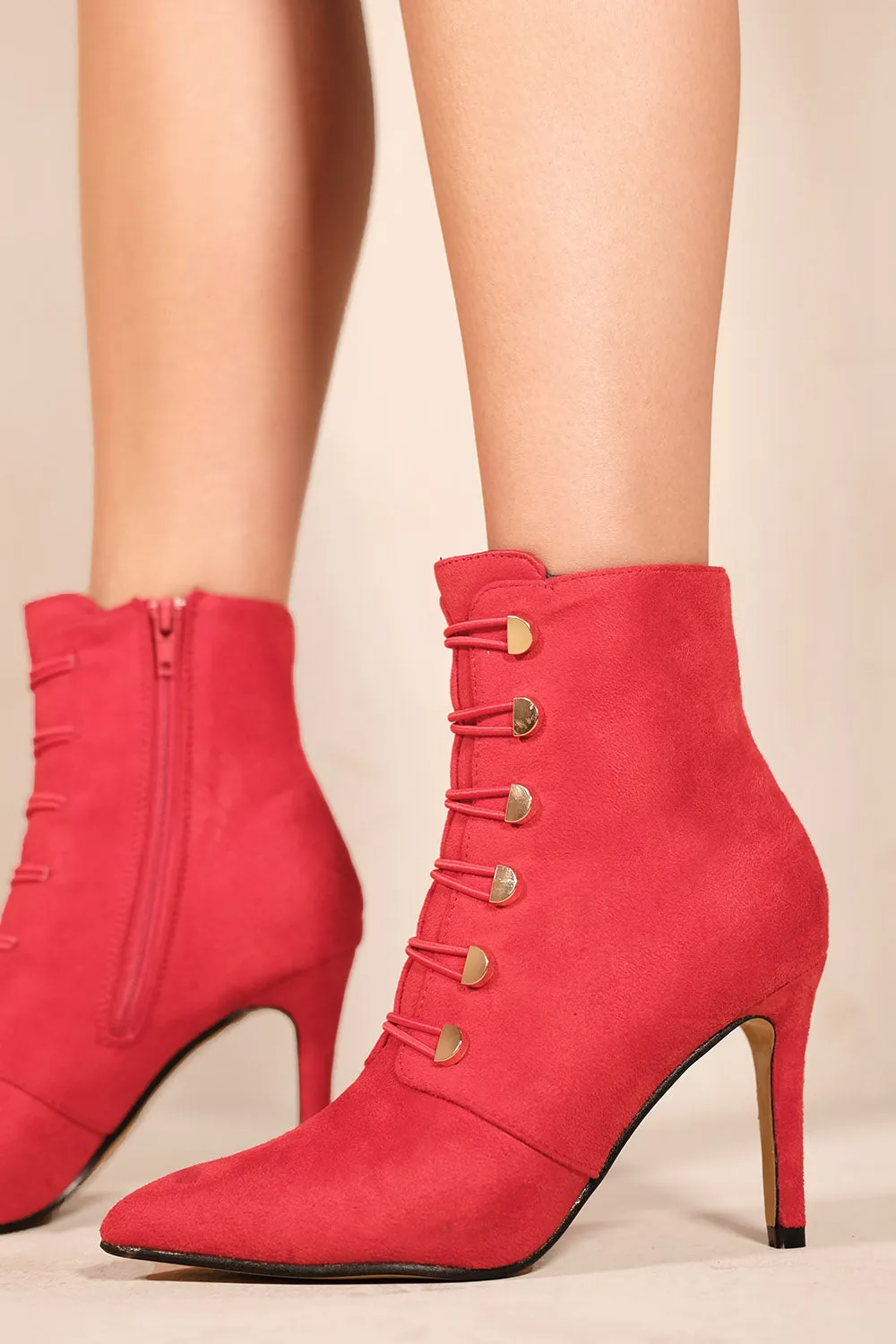 BLYTHE POINTED TOE MID HEEL ANKLE BOOTS WITH GOLD BUTTONS IN ROUGE RED FAUX SUEDE